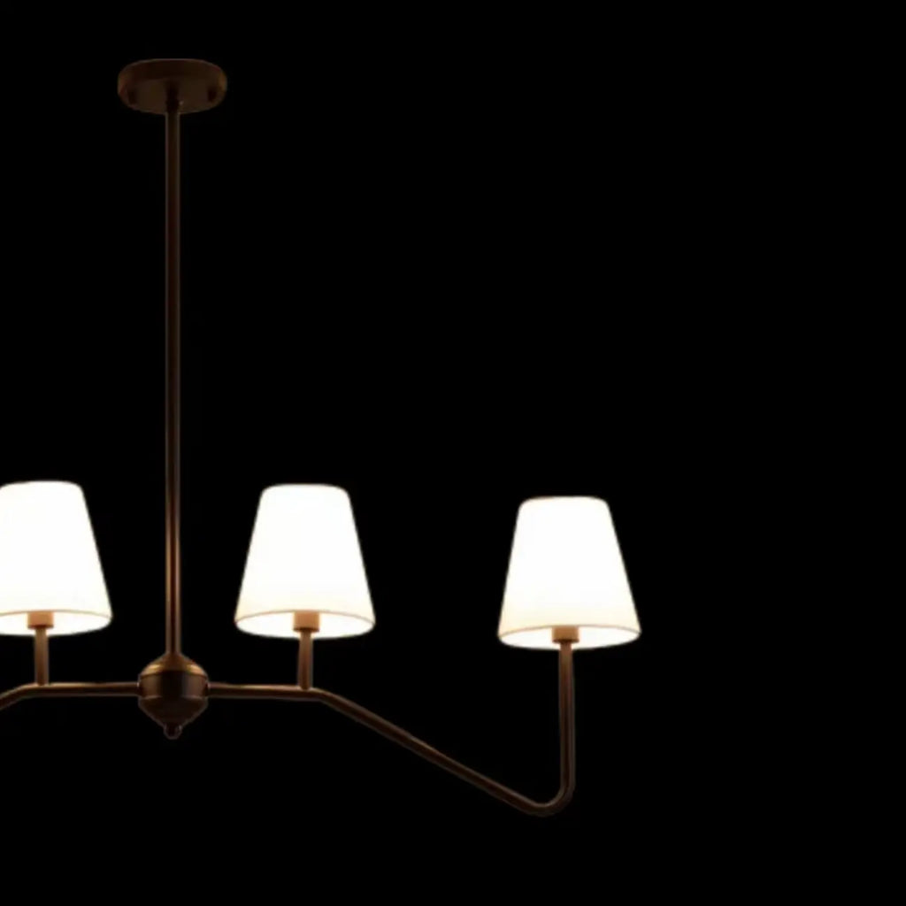 Suspension îlot en métal noir avec 4 lumières et habillage cylindrique en tissu