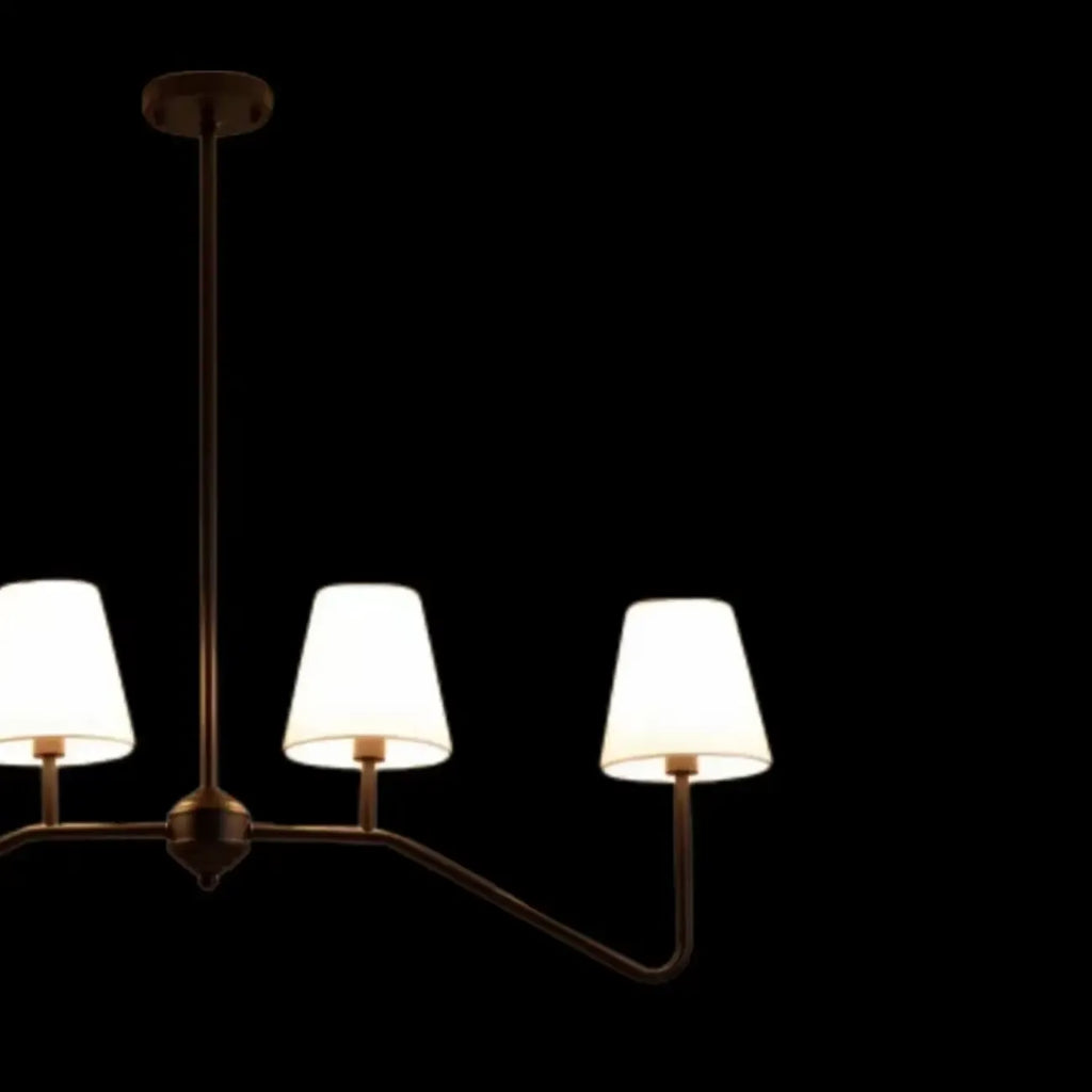 Suspension îlot en métal noir avec 4 lumières et habillage cylindrique en tissu