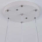 Lustre moderne à 4 lumières LED au design unique.
