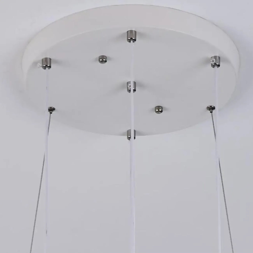 Lustre moderne à 4 lumières LED au design unique.