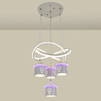 Lustre moderne à 4 lumières LED au design unique.
