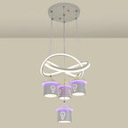 Lustre moderne à 4 lumières LED au design unique.