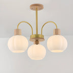 Lustre en verre blanc avec arche dorée, accents de bois et sphère en verre blanc