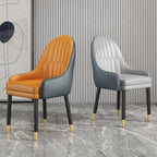 Chaise de salle à manger en similicuir, color block, accoudoirs inclinés et pieds en métal