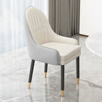 Chaise de salle à manger en similicuir, color block, accoudoirs inclinés et pieds en métal