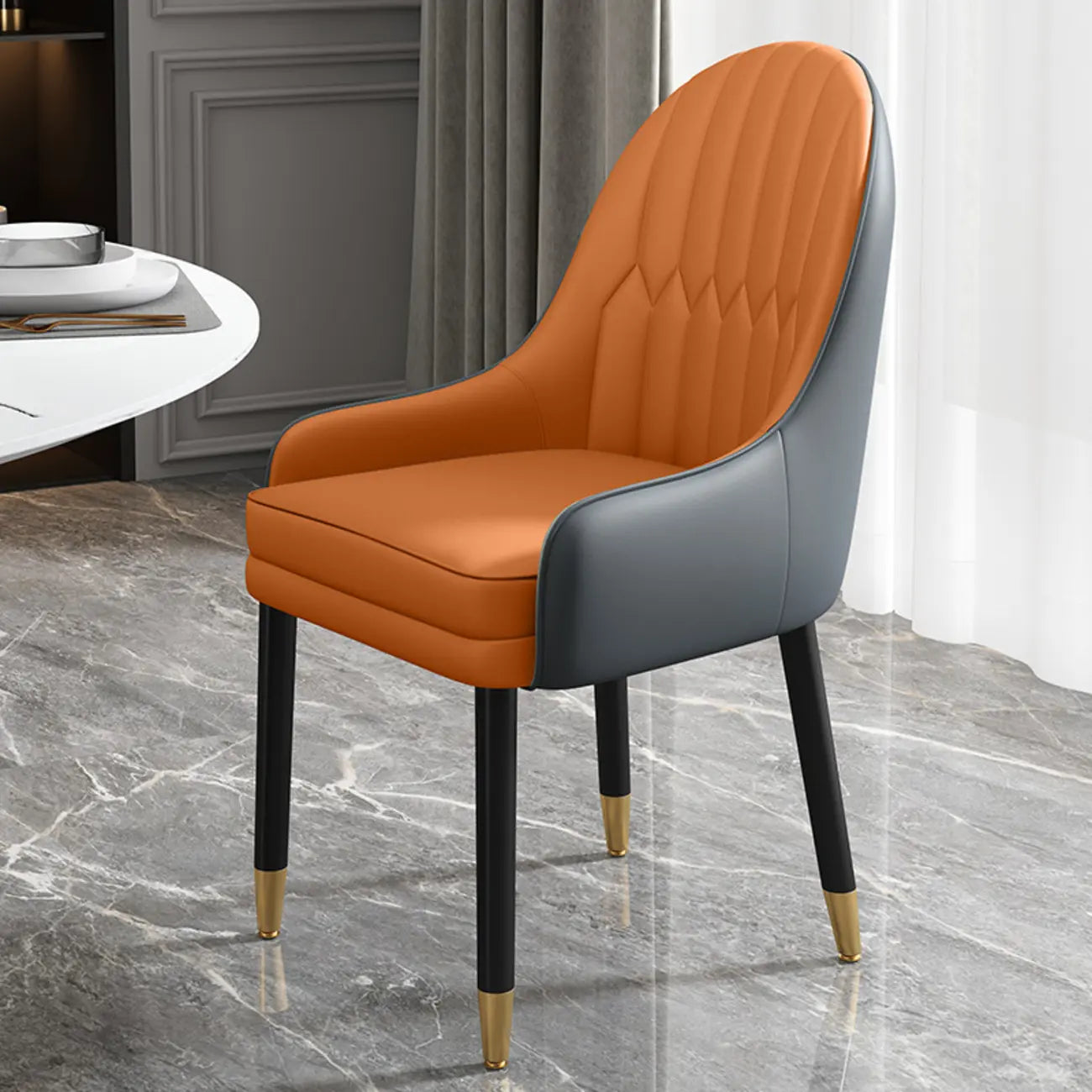 Chaise de salle à manger en similicuir, color block, accoudoirs inclinés et pieds en métal