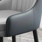 Chaise de salle à manger en similicuir, color block, accoudoirs inclinés et pieds en métal