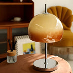 Lampe de table en verre dégradé caramel avec socle en acier inoxydable