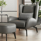 Fauteuil d'appoint moderne en cuir beige avec un coussin