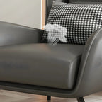 Fauteuil d'appoint moderne en cuir beige avec un coussin