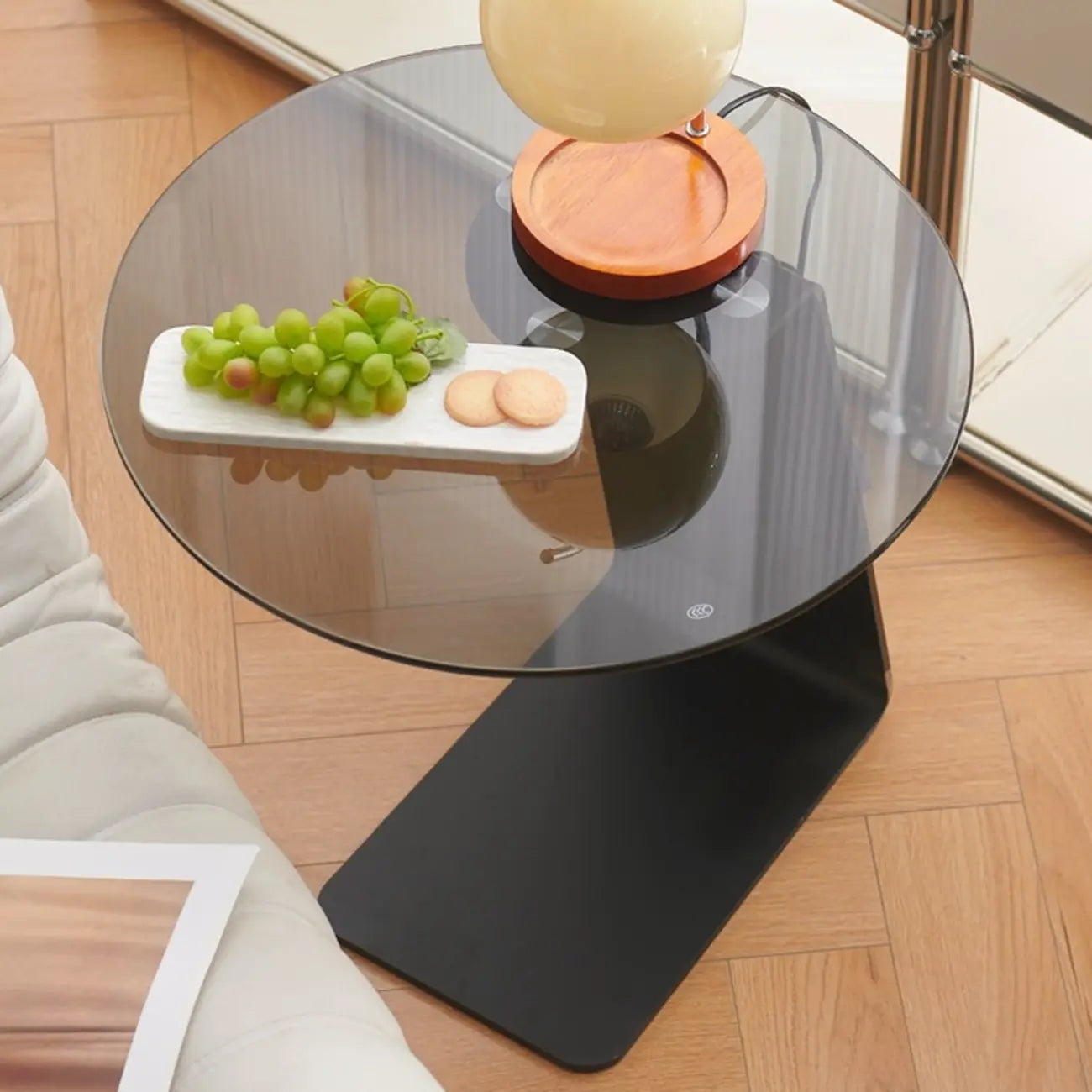 Table d'appoint ronde moderne en verre noir transparent pour canapé