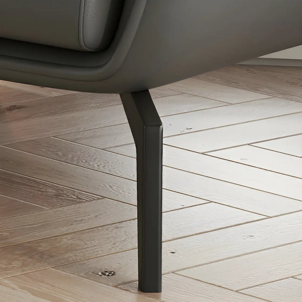 Fauteuil d'appoint moderne en cuir beige avec un coussin