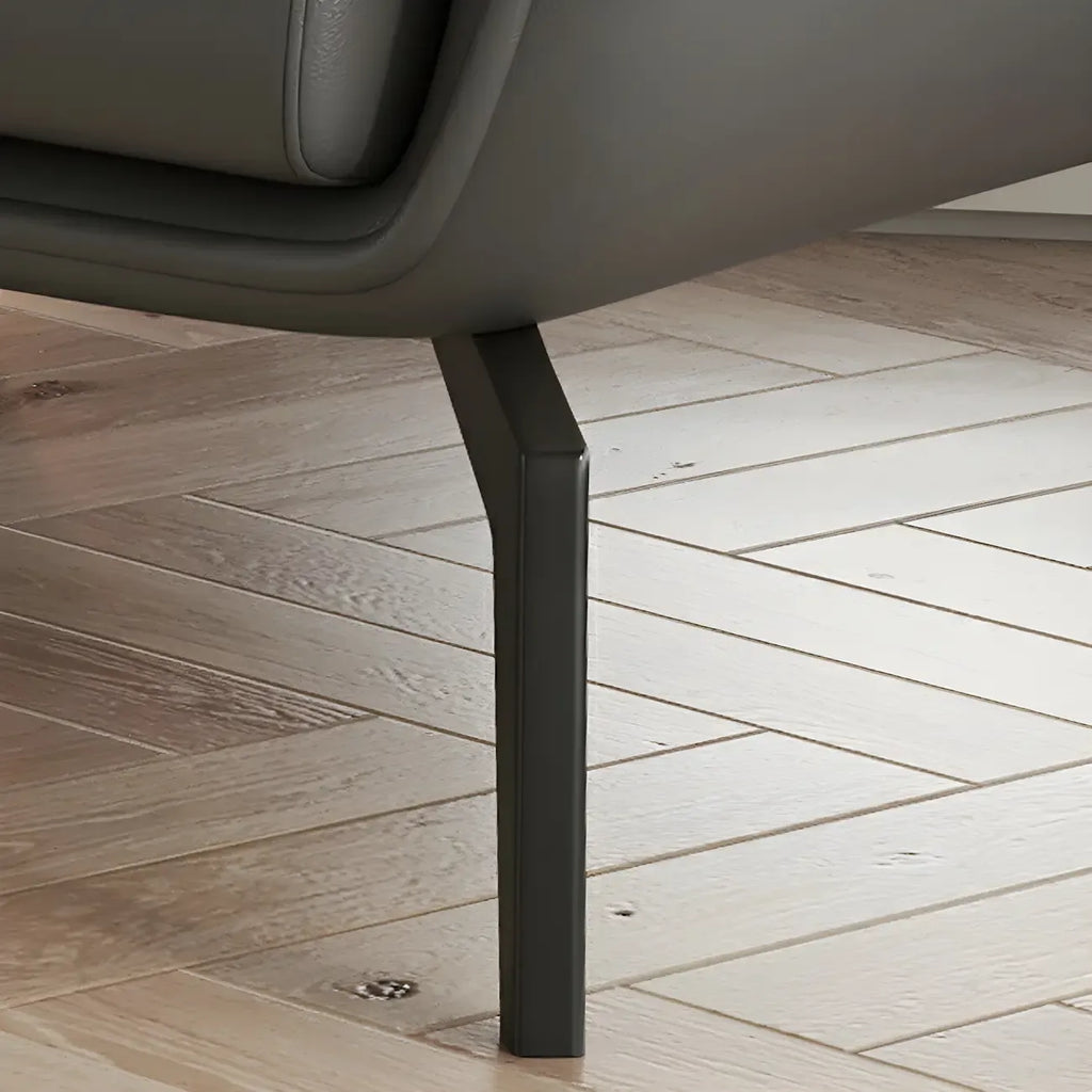 Fauteuil d'appoint moderne en cuir beige avec un coussin