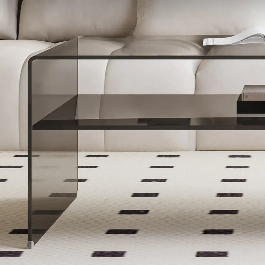 Table basse rectangulaire noire moderne au design transparent