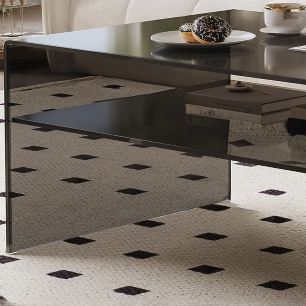 Table basse rectangulaire noire moderne au design transparent