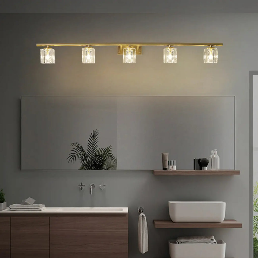 Applique murale moderne dorée pour salle de bain avec abat-jour en cristal transparent