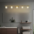 Applique murale moderne dorée pour salle de bain avec abat-jour en cristal transparent