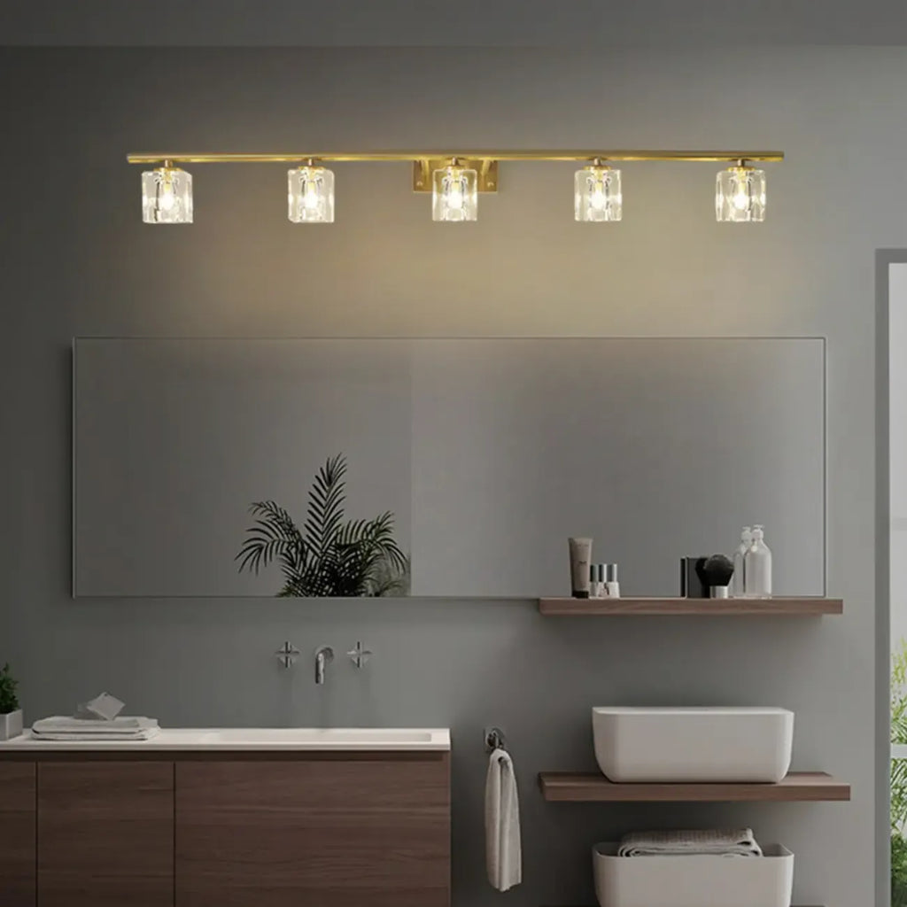 Applique murale moderne dorée pour salle de bain avec abat-jour en cristal transparent