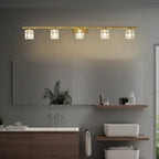 Applique murale moderne dorée pour salle de bain avec abat-jour en cristal transparent