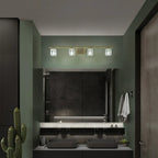 Applique murale moderne dorée pour salle de bain avec abat-jour en cristal transparent