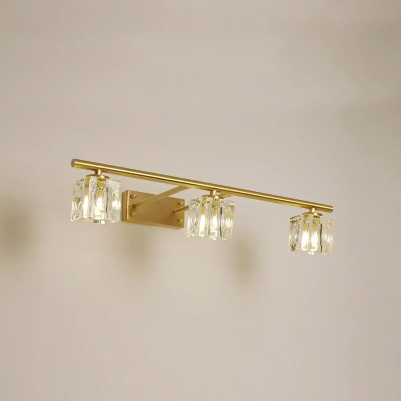 Applique murale moderne dorée pour salle de bain avec abat-jour en cristal transparent