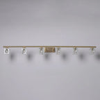 Applique murale moderne dorée pour salle de bain avec abat-jour en cristal transparent