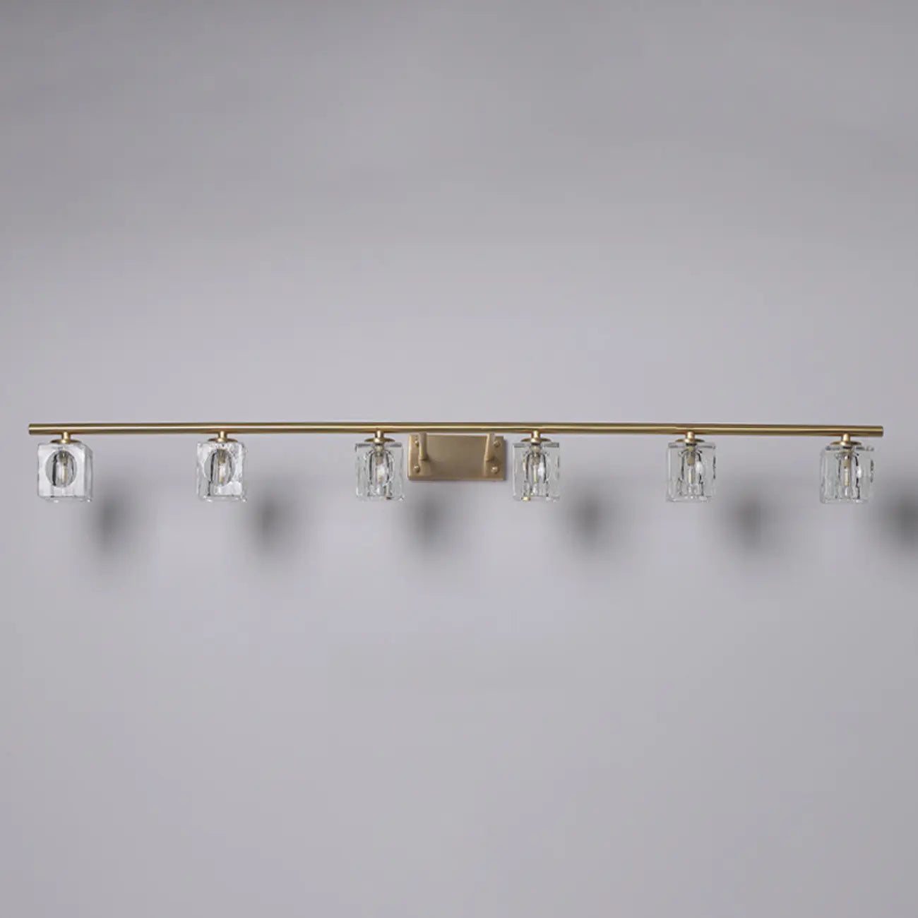 Applique murale moderne dorée pour salle de bain avec abat-jour en cristal transparent