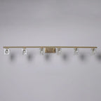 Applique murale moderne dorée pour salle de bain avec abat-jour en cristal transparent