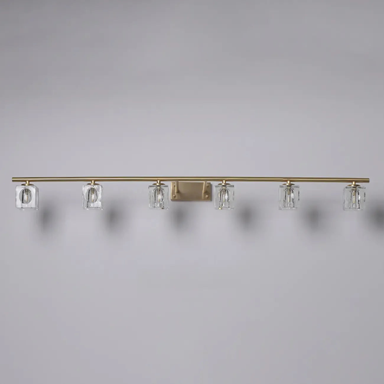 Applique murale moderne dorée pour salle de bain avec abat-jour en cristal transparent