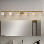 Applique murale moderne dorée pour salle de bain avec abat-jour en cristal transparent