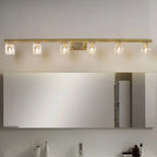 Applique murale moderne dorée pour salle de bain avec abat-jour en cristal transparent