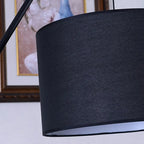Lampadaire traditionnel noir avec abat-jour en tissu plissé blanc