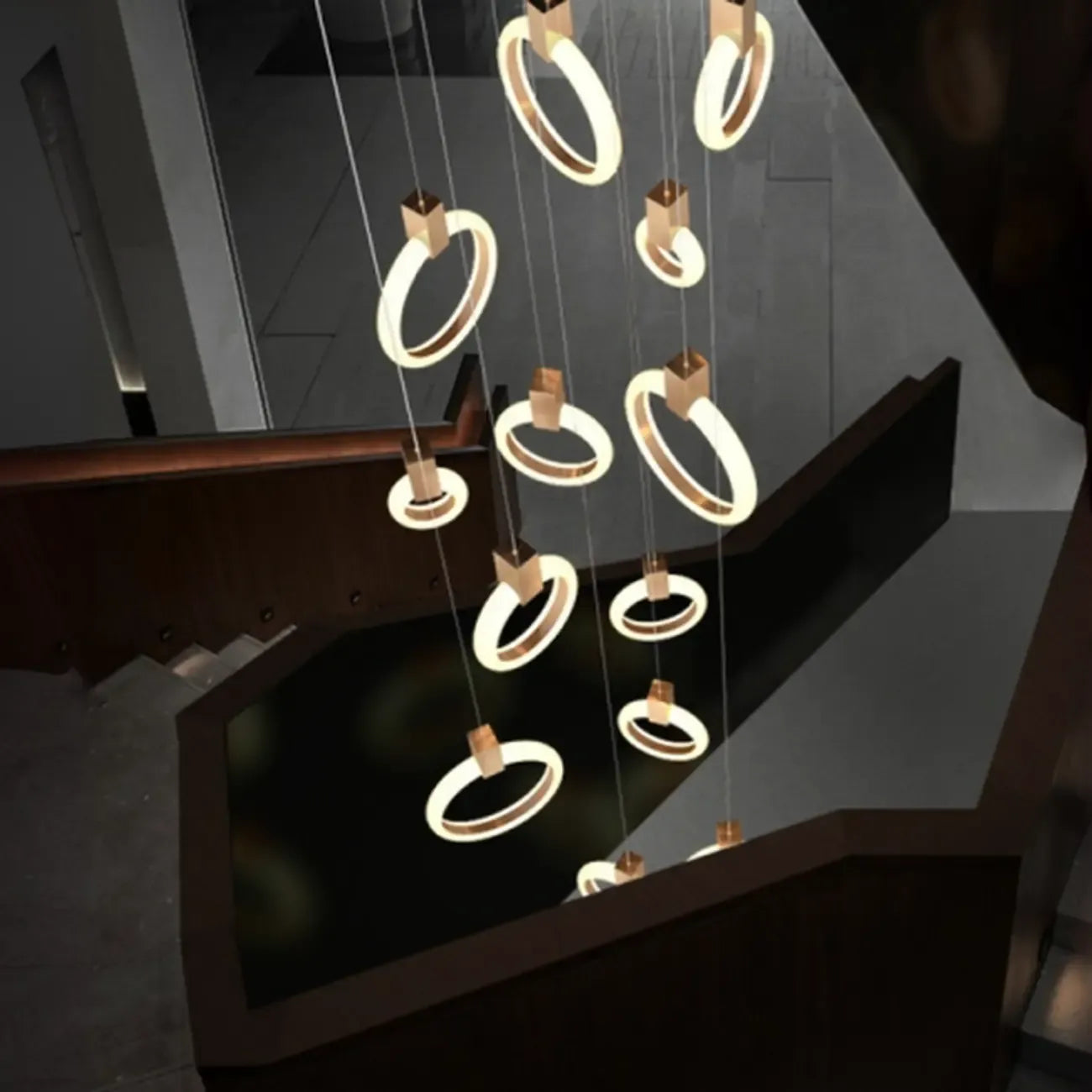 Suspension LED dorée personnalisable pour escalier
