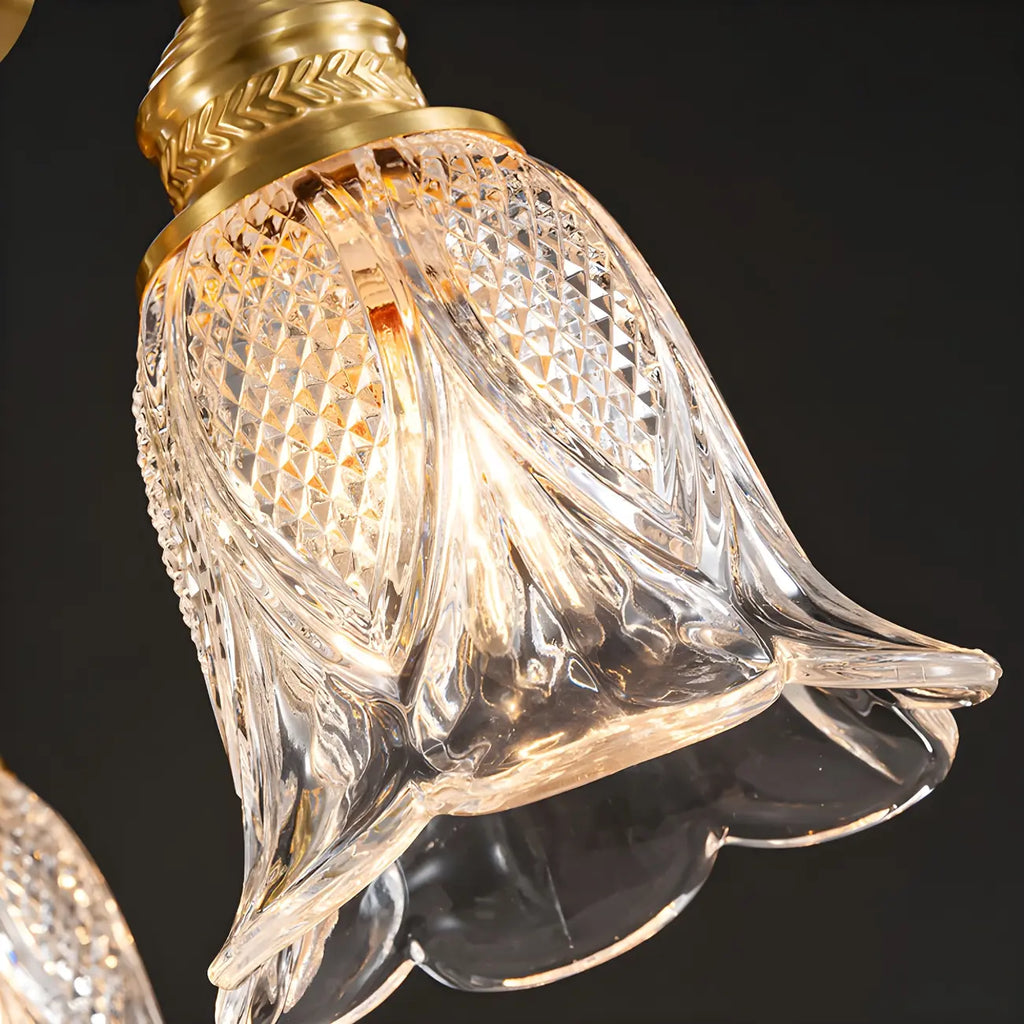 Suspension géométrique en laiton avec verre à motif floral.