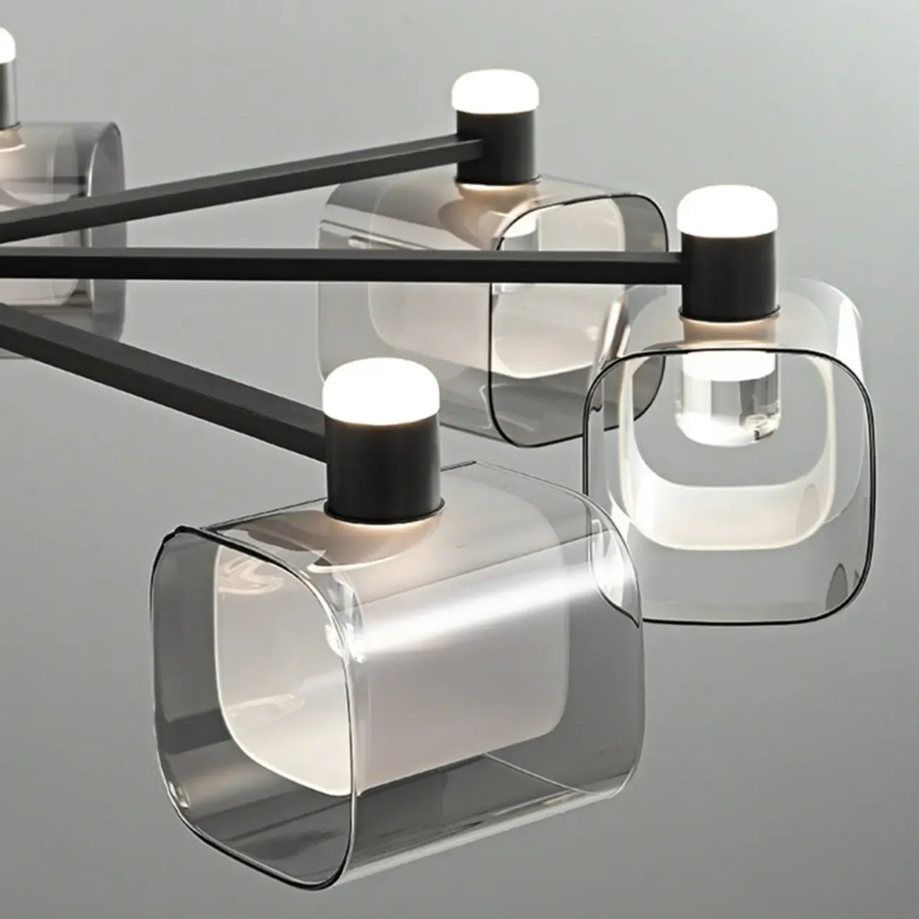 Lustre géométrique réglable en métal noir et verre transparent