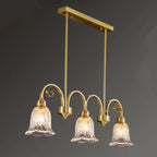 Suspension géométrique en laiton avec verre à motif floral.