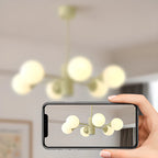 Lampadario moderno a 8 luci con globo in vetro e design regolabile