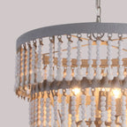 Lampadario a 3 livelli con perline in legno bianco e design elegante