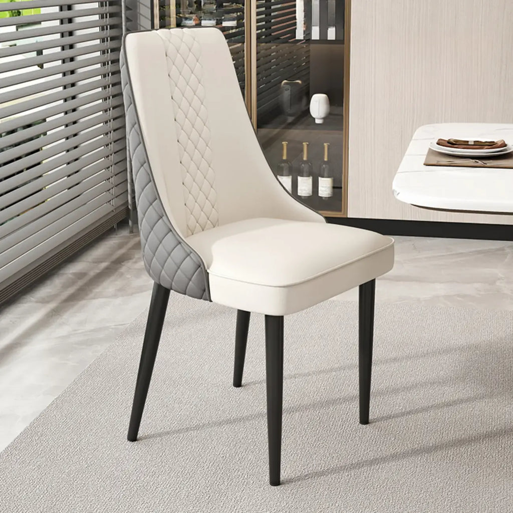Chaise de salle à manger en similicuir avec dossier haut et accoudoirs inclinés