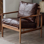 Fauteuil en cuir avec accoudoirs en bois pour salon