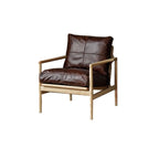 Fauteuil en cuir avec accoudoirs en bois pour salon