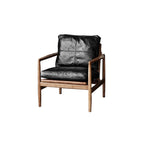 Fauteuil en cuir avec accoudoirs en bois pour salon