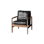 Fauteuil en cuir avec accoudoirs en bois pour salon