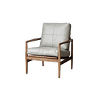 Fauteuil en cuir avec accoudoirs en bois pour salon