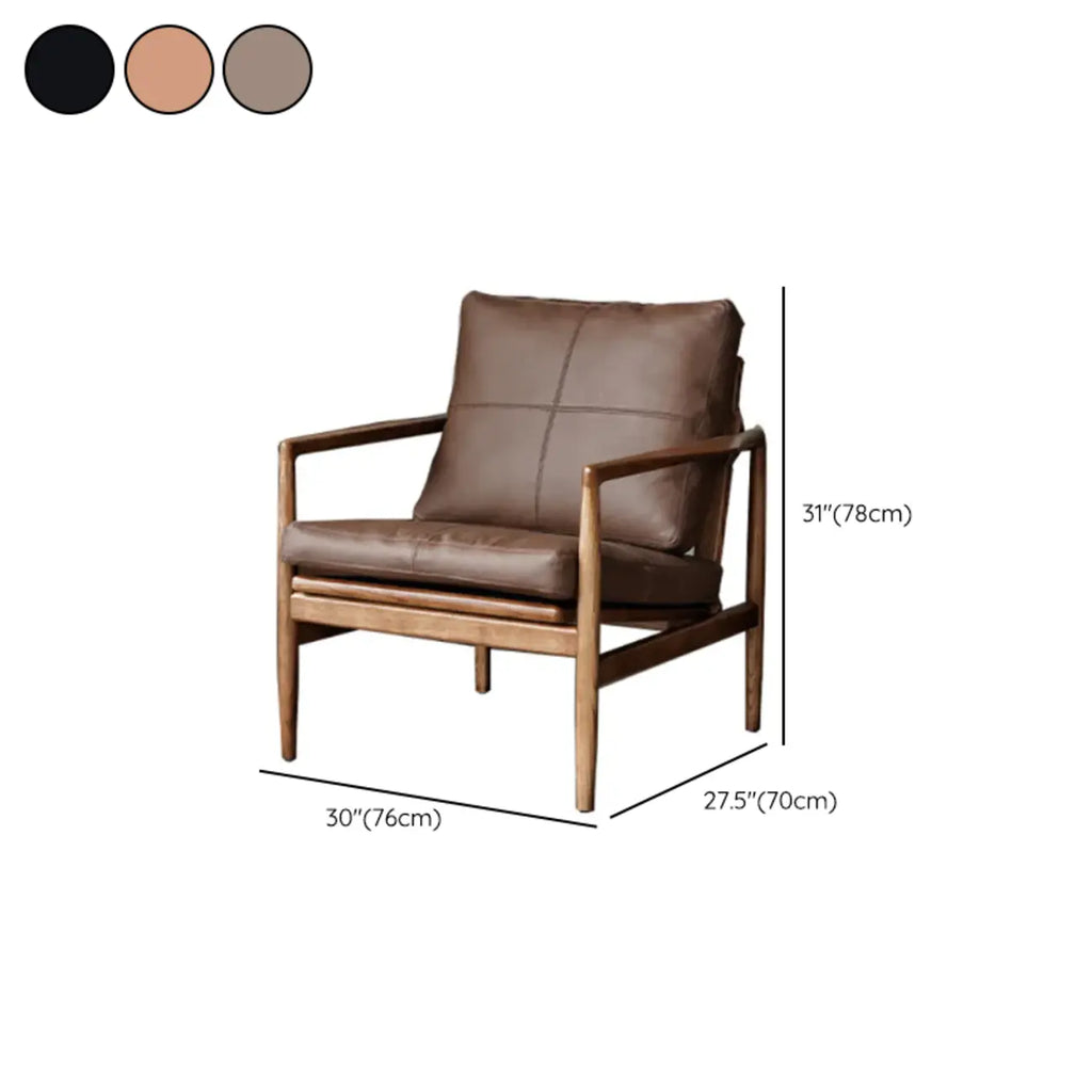 Fauteuil en cuir avec accoudoirs en bois pour salon