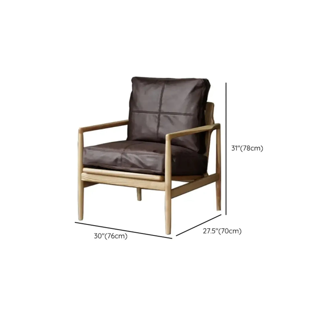 Fauteuil en cuir avec accoudoirs en bois pour salon