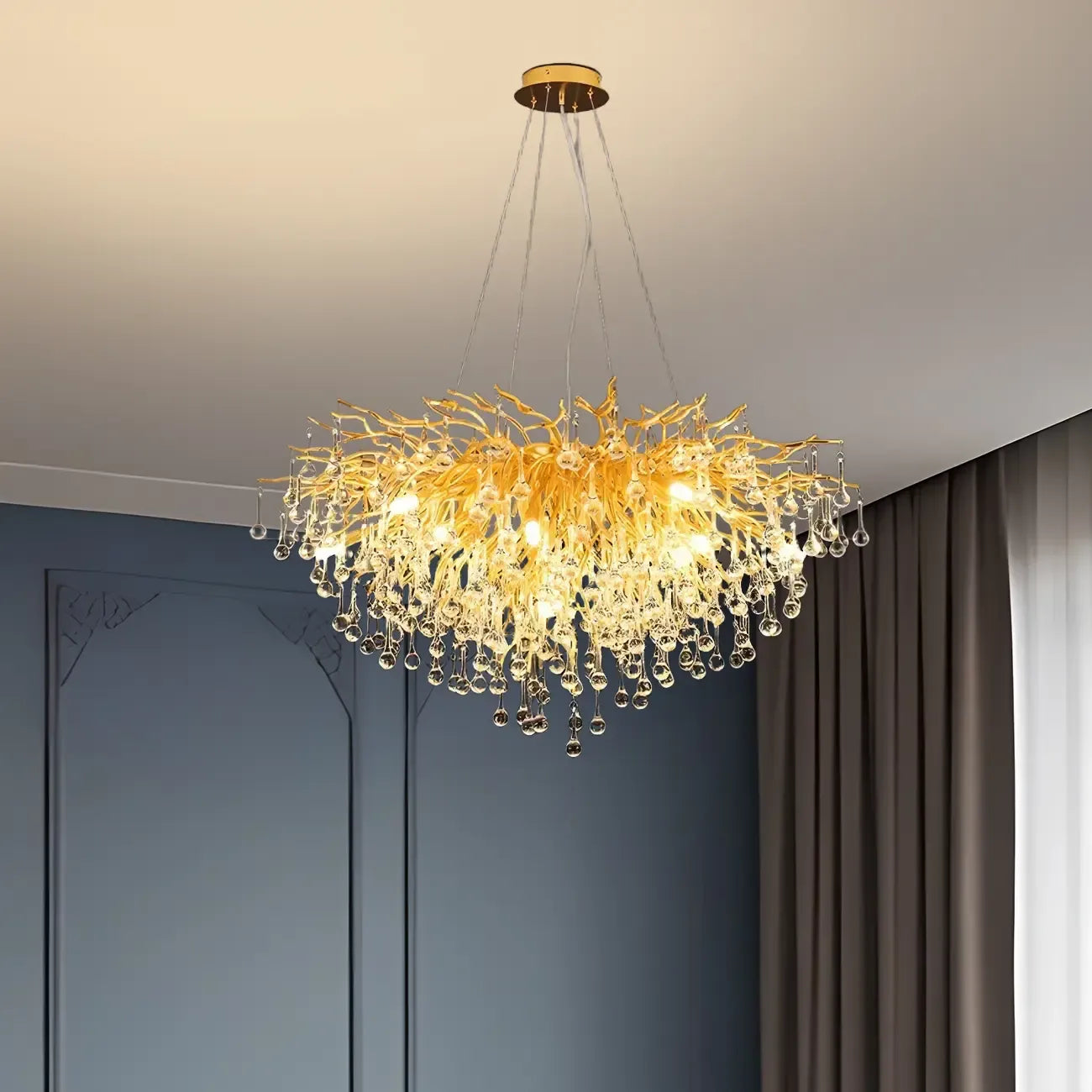 Lustre moderne en cristal avec branches dorées pour salle à manger