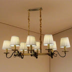 Lampadario a sospensione moderno regolabile color oro con paralume in tessuto