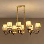 Lampadario a sospensione moderno regolabile color oro con paralume in tessuto