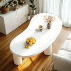 Petite table basse blanche moderne de forme irrégulière, facile à assembler